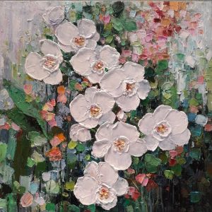 White flower in green background